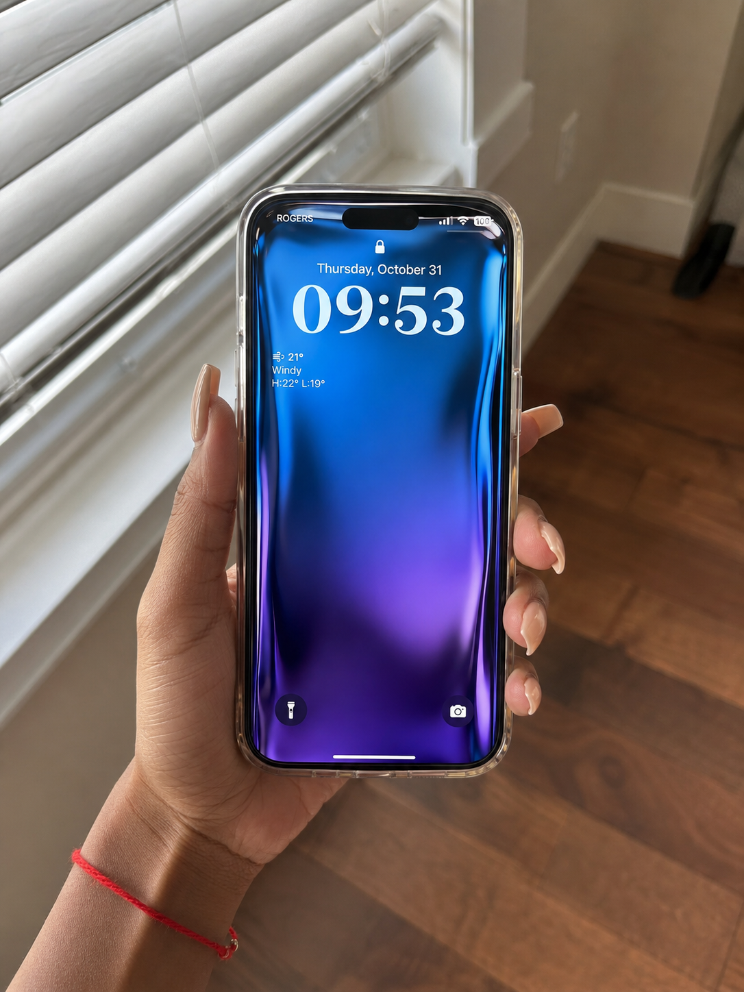 Customer photo — liquid glass wallpaper on iPhone